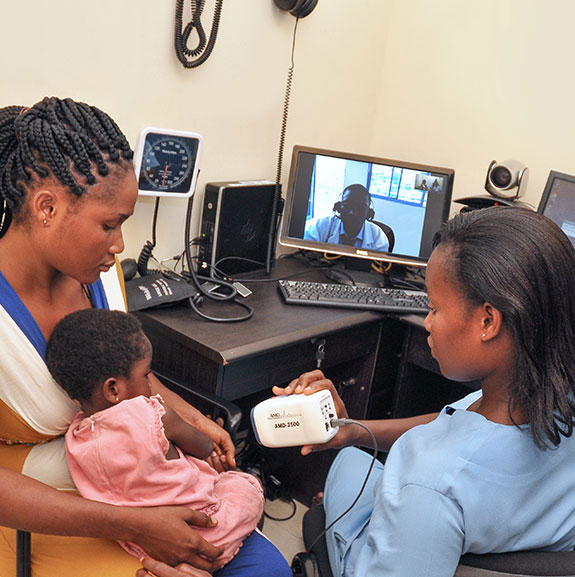 women with baby at clinic